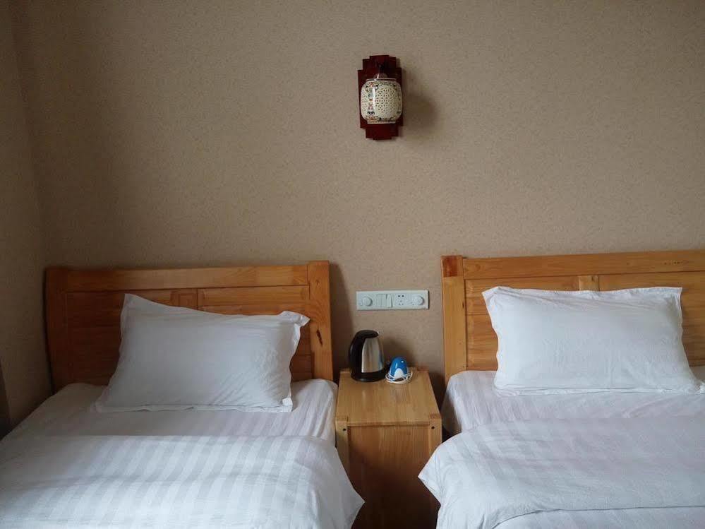 Shuanglang Jinxiangyuan Hotel Dali Shuanglang Buitenkant foto